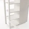 A close-up view of a white bunk bed with shelves and a cabinet. Produktbild-Vorschau