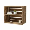 A wooden crate used as a shelf, displaying decorative items. Náhled obrázku produktu