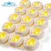 A collection of floating LED candles arranged in rows on a white background. Produktbild-Vorschau