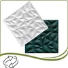Two 3D wall panels, one white and one dark green, are shown overlapping on a white background. A recycling symbol is present in the bottom left corner. Podgląd zdjęcia produktu