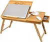 A wooden laptop table with a laptop, a cup of coffee, and a mouse on it. Produktbild-Vorschau