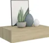 A floating shelf with decorative items on top. Náhled obrázku produktu