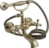 A close-up studio shot of a vintage-style bathtub faucet with a handheld showerhead. Podgląd zdjęcia produktu