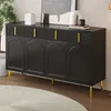 A black sideboard with gold handles is shown in a room with a plant and a rug. Anteprima dell’immagine prodotto