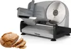 A food slicer machine with a loaf of bread and slices next to it. Anteprima dell’immagine prodotto
