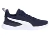 A side view of a navy blue Puma sneaker with a white stripe. Produktbild-Vorschau