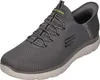 A single grey Skechers sneaker is shown from a side-angle on a white background. Náhled obrázku produktu
