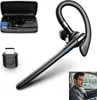 A black Bluetooth headset with its charging case and a USB adapter, shown alongside a man driving a car. Produktbild-Vorschau