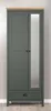 A full-front view of a two-door wardrobe with a mirror on the right door and a drawer at the bottom. The wardrobe has a wooden top and is set against a textured wall. Podgląd zdjęcia produktu