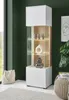 A modern white and wood vitrine displayed in a room with a dark green wall and a window. Produktbild-Vorschau