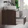 A modern bathroom vanity with a vessel sink and faucet. Voir les images du produit