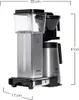 A studio shot of a coffee maker with dimensions indicated. Podgląd zdjęcia produktu