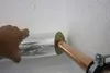 A hand is shown insulating a copper pipe with a silver-colored material. Produktbild-Vorschau