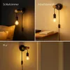 Collage of three images showing a wall lamp in different room settings. Produktbild-Vorschau