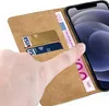 A close-up of a hand holding a phone case with credit cards and banknotes inserted. Produktbild-Vorschau