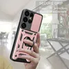 A hand holding a rose gold phone case with a ring holder and camera cover, with a blurred background of a modern interior. Produktbild-Vorschau