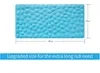 A blue bath mat with a pebble-like texture is shown with dimensions indicated. Produktbild-Vorschau