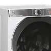 Close-up shot of the control panel and drum of a white washing machine. Anteprima dell’immagine prodotto