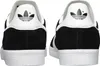 The back view of two black Adidas Gazelle sneakers with white accents and soles, set against a white background. Produktbild-Vorschau