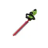 A green and black hedge trimmer with a red blade is shown against a white background. Podgląd zdjęcia produktu