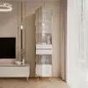 A modern living room with a tall, narrow display cabinet. Produktbild-Vorschau