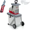 A garden shredder with a collection bag, along with pruning shears and safety glasses, displayed against a white background. Produktbild-Vorschau