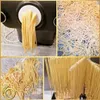 A collage of images showing pasta being made with a pasta machine and drying. Produktbild-Vorschau