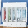 A modular wardrobe with several compartments, some open to reveal clothes hanging inside and some closed. Náhľad obrázku produktu