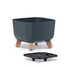 A dark gray square planter with wooden legs and a black insert, shown against a white background. Produktbild-Vorschau