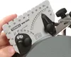 A hand is holding a Tormek WM-200 angle gauge against a grinding wheel. Anteprima dell’immagine prodotto