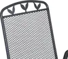 Close-up of the top part of a black metal chair back with a mesh pattern and decorative leaf shapes along the top edge. Produktbild-Vorschau