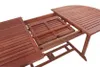 A wooden table with an extension mechanism partially extended. Produktbild-Vorschau
