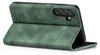 A green flip case for a Samsung Galaxy A25 5G phone is shown from the side, with the front cover open. Produktbild-Vorschau