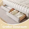 A bed with open drawers showing folded clothes, placed on a rug. Náhľad obrázku produktu