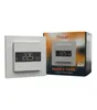 A white Heatit Z-TRM6 Z-Wave Plus Thermostat is shown mounted on a wall plate, next to its product packaging. Anteprima dell’immagine prodotto