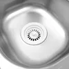 A close-up view of a stainless steel sink drain with a white strainer. Podgląd zdjęcia produktu