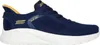 A side view of a navy blue Skechers sneaker with a white sole. Náhled obrázku produktu