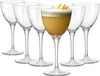 A set of six clear cocktail glasses, with one glass filled with a yellow cocktail and garnished with orange peel. Produktbild-Vorschau