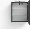 A top-down view of an open medicine cabinet with glass shelves, mounted on a white wall. Náhled obrázku produktu