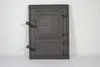 A dark gray cast iron door with two panels and two handles, set against a white background. Anteprima dell’immagine prodotto