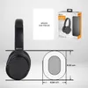A collage showing a pair of black headphones, a user manual, and the product packaging with dimensions indicated. Anteprima dell’immagine prodotto