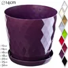 A purple plant pot with a diamond pattern and a matching saucer, shown against a white background. A list of available sizes and colors is shown on the right. Produktbild-Vorschau