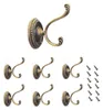 A collection of bronze-colored wall hooks and screws against a white background. Produktbild-Vorschau