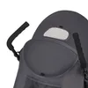 Close-up view of a stroller's canopy and handles. Produktbild-Vorschau