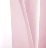 A close-up view of a pink curtain, showing its texture and folds. Produktbild-Vorschau