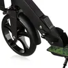 A close-up view of the wheel and frame of a black scooter. Náhľad obrázku produktu