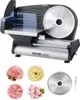 A commercial slicer with various food items and accessories. Náhled obrázku produktu