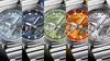 A collage of five Casio G-Shock watches with different colored faces. Produktbild-Vorschau