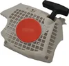 A white plastic starter assembly for a chainsaw with an orange circular insert and a black pull handle. Produktbild-Vorschau
