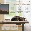 A desk with a monitor, books, and a sleeping cat. Voir les images du produit